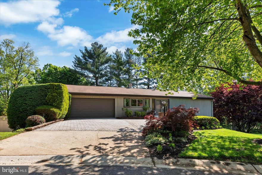 5417 Wild Turkey Lane in Columbia’s beloved Wilde Lake Village is a home that reveals its beauty gradually, rewarding every step inside with more space, more light, and more of the quiet wooded backdrop that makes this property so special. Set on a peaceful street just moments from the lake, The Mall in Columbia, the neighborhood pool, and the elementary school, this residence blends the charm of one of the village’s earliest homes with a thoughtful series of modern updates that elevate comfort and livability.

As you enter, the home opens into warm, inviting spaces freshly renewed with brand‑new carpet and crisp new paint, creating a sense of freshness throughout. Hardwood floors anchor the main level, adding richness and continuity as natural light pours in through generous windows. The vaulted ceilings lift the entire experience, giving the living areas an airy, expansive quality that feels both uplifting and serene.
The updated kitchen is a standout, designed with upgraded maple cabinetry, sleek granite countertops, and an intuitive layout that makes cooking, gathering, and everyday living feel effortless. From here, the home flows naturally toward the custom deck, a private outdoor retreat overlooking a stunning backdrop of mature trees. It’s the kind of view that changes with the seasons and offers a sense of calm that’s increasingly rare.

The five bedrooms and three full bathrooms provide abundant flexibility for multi‑generational living, guest accommodations, home offices, or creative spaces. The large family room, anchored by a fireplace and framed by views of the wooded landscape, becomes the heart of the home — a place for connection, celebration, or quiet evenings by the fire.
One of the home’s most surprising features is its multi‑level lower‑level design, including a third utility/storage level with a walkout, offering exceptional storage, workshop potential, or future expansion possibilities. The expanded two‑car garage adds even more room for vehicles, hobbies, or equipment, making the home as practical as it is beautiful.
Though the home presents modestly from the street, it unfolds into a much larger footprint than expected — a quality that delights visitors and offers the kind of spaciousness that supports a wide range of lifestyles. With newer siding, roof, and HVAC, the major systems have been thoughtfully updated, allowing the next owner to move in with confidence and ease.

Living here means embracing the best of Columbia: the ability to walk to Wilde Lake, enjoy the pathways and green spaces, access shopping and dining within minutes, and live just one block from the community pool and elementary school. It’s a home that offers not only comfort and beauty, but also a lifestyle rooted in convenience, nature, and community.