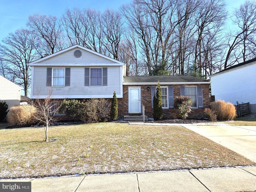 **Coming Soon**   You won’t want to miss seeing this spacious split level home in the desirable neighborhood of Goldentree in Essex.  This home has 3 bedrooms, 2 ½ baths and over 1,800 above grade finished square feet of living space.   The main level offers a combination living/dining room and a kitchen which has vaulted ceilings.  The bedrooms and hall bath can be found on the next level – up just a few steps.  The primary bedroom has its own private full bath.  Going down a few steps from the main level you will find a spacious recreational room with a fireplace and half bath – great for holiday gatherings and get togethers.  The next level down is where you will find the laundry, utilities, a workbench and plenty of space for storage.  There is a deck off of the dining room and the entire backyard, which backs to trees, is fenced.  The shed attached to the side of the home is perfect for your yard care tools.   Updates include new HVAC in summer of 2025 and LVP floor installed in 2021.  This home is in a very convenience location – close to Route 40, I-95 and minutes from White Marsh – but the best part is there is no HOA.   Schedule your showing today and see for yourself all this home offers.