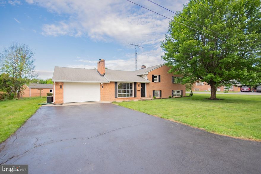 Get ready to fall in love! Available immediately, this wonderfully extra-large tri-level home sits proudly on a corner lot in a highly desirable, well-established neighborhood, and it absolutely shines with charm and comfort.  Featuring 2 brick fireplaces, quartz granite kitchen counters with waterfall edge, and so much more...

With its classic all-brick exterior and a long list of recent upgrades—including a newer roof, new  2 zone HVAC system, fresh paint throughout, updated appliances,  new gutters, new landscaping—this home offers both timeless character and the peace of mind that comes with thoughtful improvements.

Step inside and you’ll be greeted by gleaming hardwood floors and an inviting, spacious layout that feels warm, cheerful, and ready for living. Every room offers generous space and wonderful natural light, making the entire home feel bright, welcoming, and full of life.

One of the most delightful surprises awaits in the beautiful conservatory at the back of the home, where you can enjoy a little everyday luxury. It’s a truly special feature that makes this home feel unique and memorable.

Large, lively, and full of personality, this sweet, sweet home offers comfort, character, and space to spread out—ready for its next owner to move right in and start enjoying from day one.