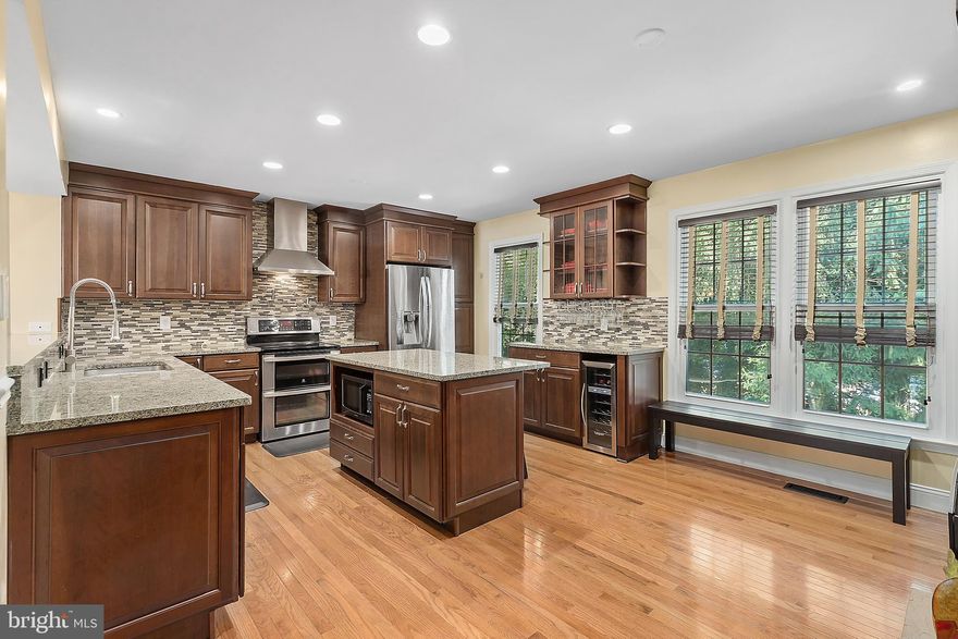 The epitome of comfort and convenience! Tastefully updated 3BD/3.5BA end-unit townhome in the desirable Churchill Square neighborhood. Upon entering, the open floorplan welcomes you into the spacious living room with built-ins. The one-of-a kind kitchen is going to wow any home chef. The large island is perfect for gatherings and hosting guests! A convenient half-bath completes the main level.

Upstairs, the expansive primary bedroom features a bonus den space perfect for a home office or extra sitting area and a walk-in closet. The en-suite bright primary bathroom updates include a beautifully tiled walk-in shower. Two additional, well-sized bedrooms share a hall bath upstairs. Downstairs, the fully updated walk-out lower level continues to impress with a homey den featuring a tucked-in mini bar. The lower level also includes another full bath. The extra privacy is great for guests and/or home office. Laundry room with additional storage also located on lower level. From the den, access the private, fenced-in backyard with a new patio.

Zoned for desirable school zones: Shrevewood ES, Kilmer MS, Marshall HS. Conveniently located only half a mile to shopping centers and restaurants, including Whole Foods, Trader Joes, Taco Bamba, Idylwood Grill. One mile away from the revitalized Birch & Broad shopping center. Only a short drive away from Tyson’s Corner, The Boro, Capital One Center for a variety of entertainment, shopping, groceries, and restaurants. Commuter minded location with easy access to West Falls Church Metro Station, I-495 and I-66. Make this townhome your home today!