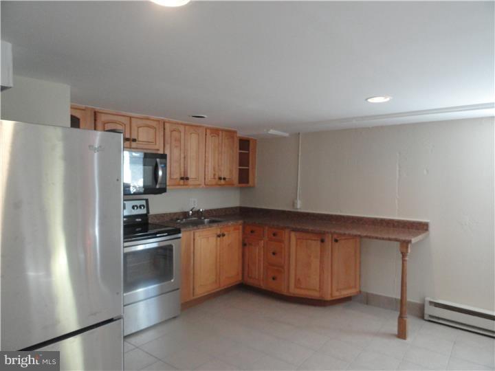 Location, Location, Location. Efficiency located 5 minute WALK from Media Station offering a 35 minute / 13 stop trip to Suburban Station. Walk score of 78 with an abundance of restaurant and coffee shop choices less than 1/4 mile walk. The Unit has been freshly renovated including Brand New Stainless Steel appliances, New Kitchen Counter tops and a breakfast bar, boasting Brand New Bathroom fixtures. Apt C has it's own Washer and Dryer in the unit and private entrance and off Street parking literally steps away from the entrance. Ground Floor living with NO Steps. Freshly Painted and plenty of natural light from the windows. Tenant pays for utilities including Heat, Water and Cable.