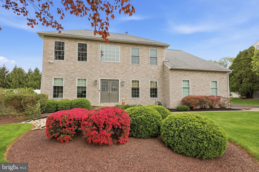 Stately brick-front Center Hall Colonial offering 4 bedrooms, 2 full baths, and 2 half baths, set on beautifully landscaped grounds with a manicured lawn and brick-accented driveway. A grand double-door entry opens to a dramatic two-story foyer, setting the tone for this well-appointed home. The main level features a private office/den with recessed lighting, a formal living room with tiled flooring, and an elegant dining room enhanced by decorative molding. The inviting family room showcases a gas fireplace with a striking stone surround, creating a warm and welcoming gathering space.
The eat-in kitchen is thoughtfully designed with custom furniture-grade cabinetry, granite countertops, a center island with wine refrigerator, a 48” custom refrigerator, stainless steel appliances, recessed lighting, and a large window overlooking the backyard. Sliders lead to a rear patio, ideal for outdoor dining and entertaining.
Upstairs, the spacious primary suite offers recessed lighting, a gas fireplace, and custom built-ins, along with a luxurious en-suite bath featuring a vaulted ceiling with skylight, elegant ceramic tile, soaking tub, oversized shower with seat and rain head, and a double vanity with granite counters. Additional bedrooms are well-sized, including one currently outfitted as a home office with built-in desk and cabinetry. A hall bath with dual-sink granite vanity and tub/shower combination completes the upper level.
The professionally finished lower level expands the living space with recessed lighting, a wet bar, exercise room, and a convenient half bath—perfect for recreation and entertaining. Completing the home is a two-car garage and exceptional curb appeal, offering the perfect blend of comfort, functionality, and refined living.
Enjoy an exceptional outdoor lifestyle just minutes from Windy Knoll Drive, with access to some of Bucks County’s most desirable parks and recreation. Northampton Township Municipal Park offers everyday convenience with sports fields, playgrounds, and community programs, while Churchville Nature Center provides a peaceful setting with scenic trails, wetlands, and wildlife viewing. Just a short drive away, Tyler State Park spans over 1,700 acres of rolling countryside, featuring biking and walking trails, kayaking along Neshaminy Creek, and picturesque open space. For a more expansive destination, Peace Valley Park showcases Lake Galena with boating, fishing, and miles of scenic trails, creating the perfect blend of active recreation and natural beauty right at your doorstep.
Enjoy exceptional convenience with a wide variety of dining and shopping just minutes away for a perfect blend of everyday convenience.