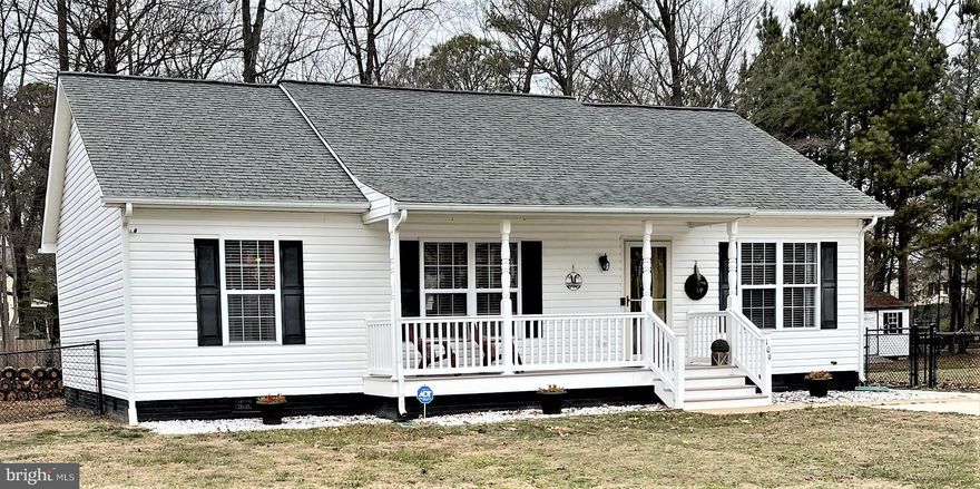 This beautiful single level 3 bedroom, 2 bath home on a level lot is ready for you to move in. The home is very well maintained, has a large primary bedroom and the eat in kitchen has enough room for a a large dining table. The washer and dryer are located off of the kitchen. Enjoy a huge fenced in rear yard for lots of warm weather fun or take a stroll along the river. You will find it an easy ride via golf cart path to town where you will enjoy the beaches, pier, breweries, tiki bar, shops, art gallery and delicious restaurants. No pets permitted please.
