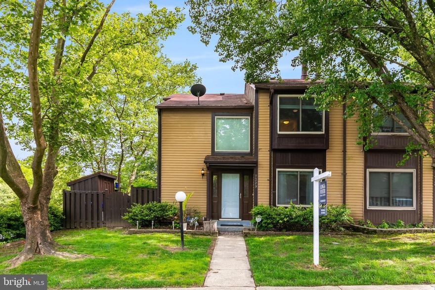 Great location! Fantastic end unit townhouse in a convenient Laurel location. Home features 2 bedrooms, 2.5 bathrooms, 2 level foyer entry, a roomy and comfy living room with wood burning fireplace, separate dining room, eat in kitchen, full size washer and dryer on main level, and outside deck for grilling and entertaining family and friends. Home has lots of windows which brings natural light, extra storage in attic, under main level staircase and outside shed. Home updates include HVAC (2021) Washer (2022) Dryer (2025) Stove (2024), Primary bathroom remodel (2021) luxury vinyl plank flooring (2022), and front door (2022). One assigned parking spot with additional visitor parking.  Home is located near commuter routes - 95, 495, 200, the Laurel MARC train station with free parking, NSA, Fort Meade, and a nice variety of restaurants and retail in the local area.  1 year home warranty.