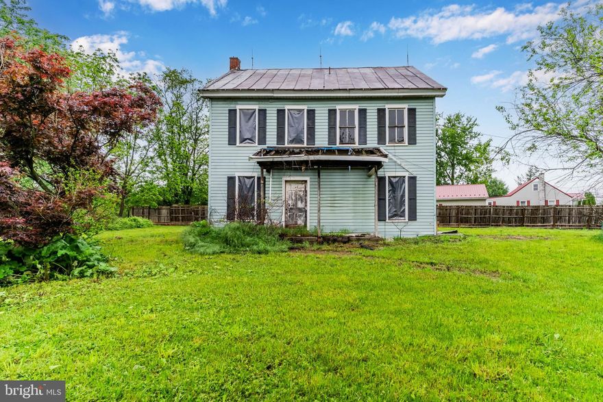 Opportunity Awaits!
This charming older home, steeped in history, sits on a spacious ¾-acre corner lot with valuable industrial zoning—offering a wide range of possibilities for the savvy investor, developer, or homeowner with a vision. Boasting 4 bedrooms and 1 bathroom, this 1860s-era home is believed to have been relocated to its current site in the 1970s, adding to its unique story.

The property has been fully gutted down to the studs, giving you a blank canvas to rehab, restore, or repurpose to fit your needs. Whether you envision bringing it back to life as a residence or transforming it for a new use, the potential here is undeniable.

Set in a desirable and growing area, the location is incredibly convenient—literally within walking distance to nearby warehouses and just minutes from key employment hubs.

The property currently includes a 750-gallon septic system that is functional and on a 5-year pump schedule with West Pennsboro Township. However, Rosenberry’s and the sellers were unable to locate an active well. Please note, the existing septic system would need to be upgraded to meet the needs of a four-bedroom home. A cost estimate from Rosenberry’s for this upgrade is included in the documents section.

For those interested in exploring the possibility of public water and sewer hookups, we recommend contacting West Pennsboro Township directly to inquire about potential tie-in options, if available. 

This property is being sold AS-IS. Don’t miss your chance to reimagine this historic gem!
