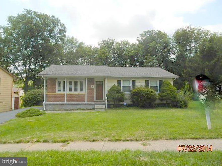 Terrific Ranch home features spacious kitchen that walks out to large, private back deck.  Basement with family room, bedroom and full bath offers potential for in-law quarters.  Extra storage in the large laundry room.