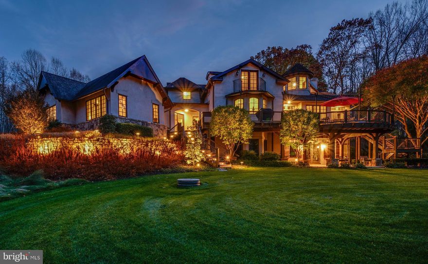 Live authentically. Unparalleled lifestyle walking distance to the NCR trail. A gated, tucked away, tranquil haven on 10.53 glorious acres. Spectacular Vincent Greene designed french country with an infusion of mountain escape aesthetic. Revel in the strength of handsome hand hewn beams. A vision realized. A luxury retreat. Curated materials. An elemental combination of stone, wood, and glass soothes the soul. Captivating western accents. The ultimate cooking space for creating. Step into your magnificent great room and imbibe by the crackling fire, soaring ceilings and wall of glass that seamlessly opens to the great outdoors. Breathtaking views off your expansive mahogany/ipe terrace. The sense of peace is palpable. Luxe first floor owner suite. State of the art spa bath. Radiant heat. Superb dressing areas. Serene sleeping space. Partially above grade newly finished lower level complete with guest suite and workout space. Loaded with light. Covered outdoor terrace... enjoy owls, humingbirds and hawks coming to visit. Stellar landscaping complete with irrigation system. Parking for five cars and ample space for your large gatherings. Architecturally enduring Kolbe and Kolbe windows throughout. Copper gutters. First time offered. Xfinity internet. Cultivate your existence. The art of uniting human and home.