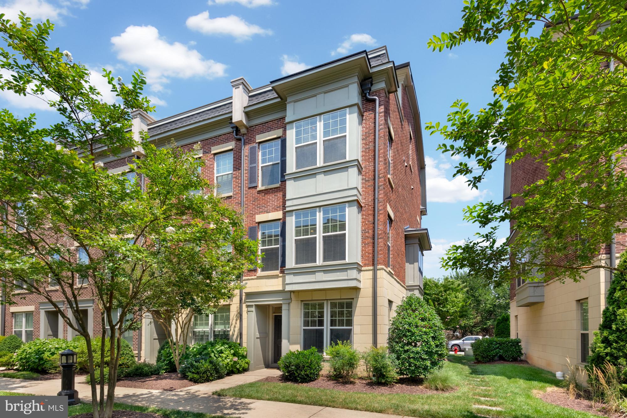 VA Assumable Loan!
Welcome to 839 Regents Square — an exceptional four-level end-unit townhome nestled within the sought-after gated community of Potomac Overlook at National Harbor in Oxon Hill, Maryland.
Perfectly positioned just moments from National Harbor’s vibrant waterfront, shops, dining, and nightlife, this beautifully maintained 2,741 sq ft home seamlessly combines luxury, comfort, and convenience. Built in 2015, it features 3 spacious bedrooms, 3 full baths, 2 half baths, and numerous high-end upgrades throughout.
Upon entering, you’re welcomed by a gracious foyer leading to a private first-floor bedroom with its own full bath—ideal for guests, a home office, or flex space.
The second level offers an inviting open-concept layout with sunlit living and dining areas. At its heart is a chef’s kitchen complete with stainless steel appliances, a large breakfast bar, range hood, and ample cabinetry—designed for both everyday living and effortless entertaining.
Upstairs, the third level hosts a luxurious primary suite featuring a spa-inspired bath with double vanities and his-and-hers customized Elfa closets. A second bedroom suite on this floor comes with its own full bath and walk-in closet with custom storage, conveniently adjacent to the dedicated laundry area.
The top floor is truly an entertainer’s dream—an expansive loft with a double-sided gas fireplace, a stylish wet bar equipped with a beverage fridge and dishwasher, a powder room, and a private rooftop terrace perfect for gatherings or quiet evenings under the stars.
Additional highlights include a rear-entry one-car garage with driveway parking and ample guest parking nearby. Residents enjoy the security and serenity of this gated community, complete with manicured grounds, jogging paths, and HOA-covered services such as lawn care, snow and trash removal, road maintenance, and water.
With easy access to DC, Alexandria, Andrews AFB, and major commuter routes, 839 Regents Square offers upscale living in one of the region’s most convenient locations. Don’t miss the opportunity to make this stunning home your own.
All square footage is approximate.
If Buyer chooses KVS Title for closing, they will receive a $500 closing cost credit from KVS.