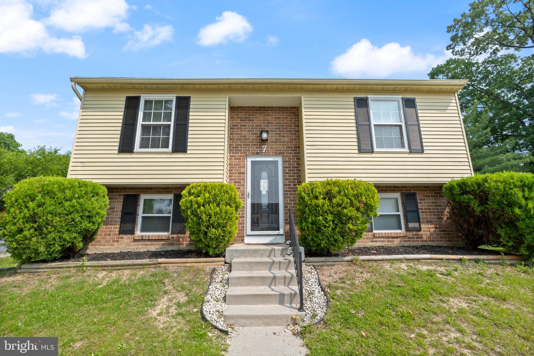 Beautifully renovated 3BR/2BA split foyer Ranch located on a corner lot in the quiet neighborhood of Perry Hall. Ample parking is just steps from the front door into your forever home. Step inside to a home filled with natural light, a neutral color palette, glamorous lighting fixtures, and stunning flooring. The main floor offers a large living room, a spacious dining room, a new kitchen, three bedrooms, and a brand new full bath. The kitchen features plenty of cabinets to the ceiling, stainless steel appliances, quartz countertops with a complimenting tiled backsplash, and a stainless sink. The lower level offers additional living space featuring above grade windows, a full bath with a walk-in shower and a double sink vanity, a possible 4th bedroom or home office, space for the family to enjoy, laundry, storage, and a walk-out to the yard. From the sliding doors on the main floor, step outside onto a large deck that overlooks the yard offering so many possibilities. This home is move-in ready with so much to offer new homeowners, and is located in close proximity to shopping, restaurants, and commuter routes.