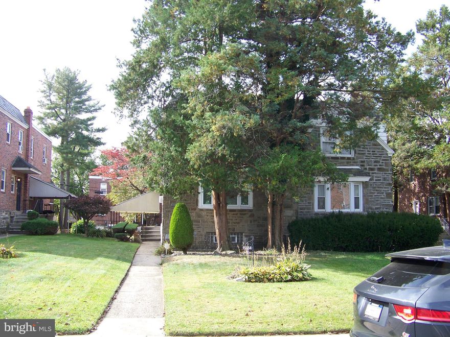 This property is for serious investors. This brick twin is in the popular section of Mount Airy. The four bedroom home is in need of a full renovation. There is a bow on the side of the structure.  There is an updated 100 amp electrical service. This property has 4 bedrooms, 2 full baths and 2 half baths.  The main bedroom has an on suite bathroom with a walkin shower. It also has a partially finished basement. The kitchen has newer cabinets and light fixtures.