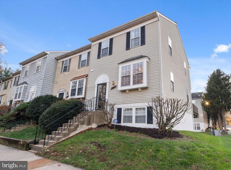 Welcome Home! This beautiful 4 bedroom end townhouse is move in ready. It boasts hardwood floors, new carpet throughout, stainless steel appliances and full sized washer and dryer. The deck and basement are perfect for entertaining. This home is priced to sell and ready for its new owner!