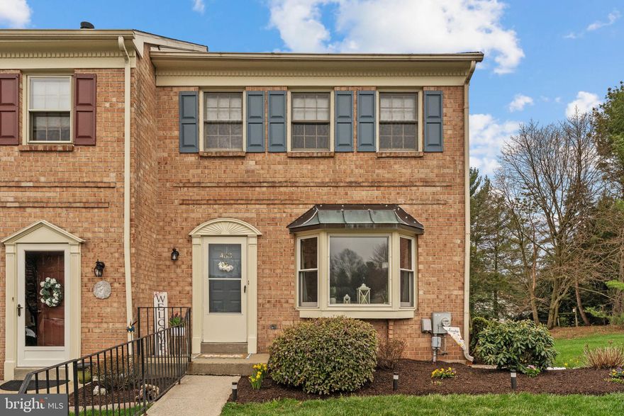 Discover this exquisite end unit townhouse, designed for modern living with an open floor plan that floods the space with natural light. The inviting living room and dining area feature newer laminate flooring and recessed lighting, creating a warm and welcoming atmosphere. The kitchen has plenty of cabinet and counter space, and boasts a cozy breakfast area and sliding doors that lead to a spacious deck, perfect for outdoor entertaining. Upstairs, you will find three well-appointed bedrooms and two full baths, providing ample space for comfort. The fully finished basement offers additional versatility with a family/game room, laundry facilities, and sliders leading to a charming backyard patio. Enjoy the large deck with stairs that descend to the rear yard, surrounded by plenty of open space. Located close to Skippack Village, this home is conveniently situated near dining and shopping options in a highly regarded school district. With plenty of open space both indoors and outdoors, this townhouse is ideal for those seeking comfort and convenience in a traditional setting.