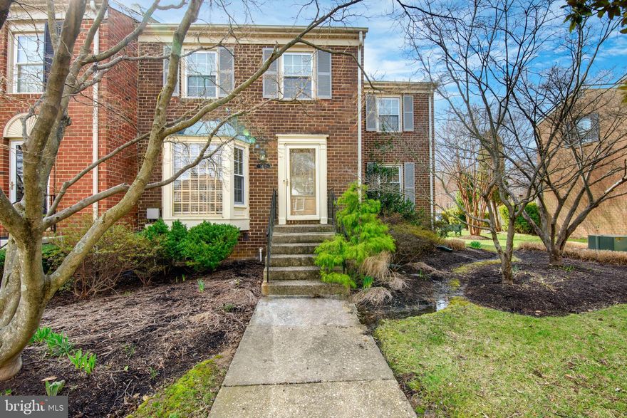 Exceptional all-brick, end-unit townhome with three-level bump-out located in the highly desirable Bay Hills – Tanglewood community, offering expanded living space on every floor and beautiful finishes throughout.   The Kitchen is beautifully appointed with granite countertops, stainless steel appliances, plantation shutters, and a sun-filled bay window, creating a bright and inviting space for everyday living and entertaining and Living Room with hardwood floors and wood burning Fireplace with built-ins.
Step outside to the newly built deck overlooking a fenced backyard with walk-down to patio, ideal for outdoor gatherings and private relaxation. Two assigned parking spaces right out back.

The fully finished lower level offers new carpet, a spacious Rec Room, and office/bedroom, full bathroom and laundry room, perfect for guests, remote work, or multigenerational living.
Upstairs features new carpet and generously sized bedrooms including a spacious owner’s suite, with the rare three-level bump-out providing additional square footage rarely found in this community.

Major updates:  New Roof 3/2026,  HVAC 2017, Carpet 3/2026, hot water heater, relined chimney, and freshly paint throughout, providing peace of mind and true move-in-ready condition.  Ideally located within walking distance to Bay Dale Shopping Center, grocery store, restaurants, dentist, Vet, and everyday conveniences, and just minutes to Annapolis, commuter routes, and the Bay Hills Golf Club.

A rare opportunity to own one of the largest and most upgraded townhomes in Bay Hills Tanglewood.