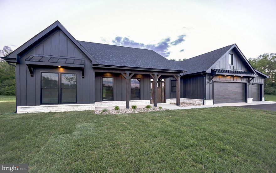 HOME IS COMPLETE AND AVAILABLE FOR A QUICK MOVE IN!

The Reserve at Tuscarora: a luxury, low-maintenance ranch community designed by Panhandle Homes of Berkeley County.  This design is part of the Panhandle Homes Signature Series collection:  elevated design, upscale finishes, and attention to detail.

This new construction home is move-in ready.  Premium exterior details such as LP SmartSide vertical siding with a 50-year limited warranty, Ply Gem MIRA Series windows and wood plank style insulated garage doors with LiftMaster openers that are wifi enabled with an integrated camera.  Upgraded Trane 16 SEER heat pump with a 10-year manufacturer’s warranty.
TWO gas fireplaces, one in the living room and a second on the expansive 22’x12’ covered rear porch, both with floor-to-ceiling stone and a raised hearth! 

9’ Kitchen island with storage, soft close full overlay cabinetry, GE Profile appliances, Zellige tile backsplash and black LEATHERED granite with white veining.  

The Owner’s Suite has LVP and a ceramic tile shower, with a built in 12”x20” custom niche and a heated bathroom floor.  

Begin your next chapter in a home built for the way you want to live; with comfort, elegance and ease at every turn.