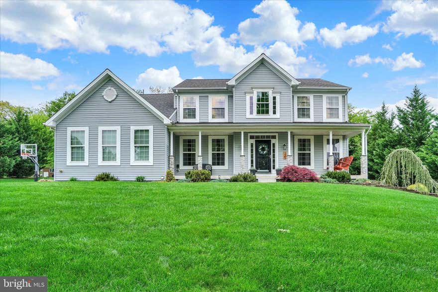 Don’t miss your opportunity to own this beautiful, updated colonial home—offering everything you’ve been searching for.

As you step inside, you’re welcomed by a spacious, open foyer featuring luxury vinyl plank flooring that flows throughout the main level. To the right, you’ll find a formal living room—perfect for greeting guests—while the formal dining room sits to the left, ideal for hosting gatherings.

Continuing toward the rear of the home, a private office is tucked behind the living room, offering flexibility as a potential main-level bedroom for guests or multigenerational living.

The large family room features a cozy fireplace and hearth—perfect for relaxing on chilly evenings—and flows seamlessly into the expansive kitchen. Designed with both function and entertaining in mind, the kitchen offers ample space for meal prep and hosting. Just off the kitchen, a bright breakfast area provides the perfect spot to start your day and opens directly onto a treated lumber deck overlooking a spacious, one-acre yard.

A well-designed mudroom completes the main level, providing a convenient space to store gear and keep the home organized.

Upstairs, you’ll find five generously sized bedrooms to accommodate a variety of needs. The highlight is the impressive primary suite, featuring a cathedral ceiling, large walk-in closet, and a beautifully updated en-suite bathroom with dual vanities, a tiled shower, and a soaking tub.

The finished lower level adds even more living space, including a laundry area, fitness room, expansive entertainment space with walk-out access, and a potential seventh bedroom with a full bath—ideal for guests, in-laws, or returning family members.

This home truly has it all—schedule your private tour today before it’s gone.