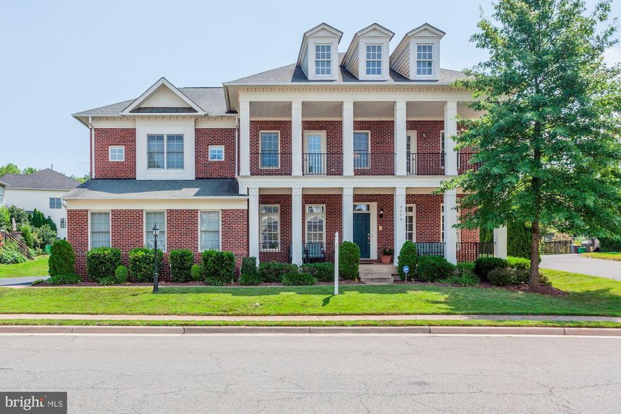 Exquisite light filled estate home in Sumner Lake.  This well appointed Manor home includes over 6,000 sq ft of living area, dual staircases, 3 car side load garage, custom built bookcases, 10' ceilings on the main level, 9' ceilings upstairs, upgraded moldings, gas fireplace and more.  Move-in ready with newly finished hardwood floors, new carpet and fresh paint.  Open concept, with two story foyer and family room bring in tons of light.  Gourmet chefs kitchen, cherry cabinets, large eat-in area, butlers pantry and large storage pantry.  Oversized master suite with dual walk-in closets and large sitting area.  Master bath has Jacuzzi tub, walk-in shower and separate sinks.  Two upper level bedrooms include en suite bathrooms.  Finished lower level with wood floors, recessed lighting and workshop area or future theater room.  Newer Trex deck and stone patio back to woods. Close to VRE, shopping and restaurants.