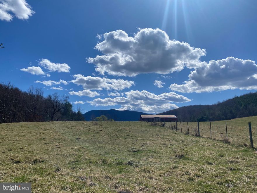 Rare opportunity for 3+acres in the Browntown  area.   Beautiful views of pasture, cattle, and the large mountain called Hogback in Shenandoah National Park as well as parts of the drive.  This lot is surrounded by cattle farm on two sides and field/creek on the other.  Nearby hikes and the Shenandoah river where you can put in your own kayak or rent one, about 7 miles to the entrance to Shenandoah National Park- Skyline Drive, award winning Glen Manor Vineyard only a few miles away.   Come build a vacation or forever home.  Agent/owner must be present to show.  Approved for 3 bedroom alternative septic
