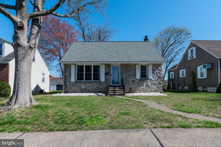 This charming stone-front Cape Cod has a solid, classic appeal, with a clean and well-kept interior that’s ready for the next loving owner.  Situated on a favorite street in Pottstown, this home is a sweet treasure.   A beautiful large bay window is a focal point, bringing in an abundance of natural light that fills the living room with warmth and brightness. The eat-in kitchen is stylish and modern and ready to accomodate your cooking, meal prep and dining needs and includes new stainless steel appliances and a dishwasher!  Step out the back kitchen door to enjoy the covered rear patio which opens to a nice backyard—ideal for outdoor gatherings or just relaxing with some private green space.  There is off street parking from the alley way but it is not paved.  Feel free to make it paved if you prefer. The home features four nice sized bedrooms, two on the main level (as well as a full hall bath) and two on the upper level. The spacious unfinished basement offers plenty of room for your personal versatility.  The large utility room with a washer and dryer (included in the sale!) plus added storage space is an asset to this home.   Some big ticket items are done for you including a new architecural shingled roof, new windows throughout, a hot water heater and a new oil tank.  Your lawn equipment and tools can be kept in the rear shed and already has some money saving tools and equipment stored and ready for the new owner. (See inclusions)  A move in ready home with great bones and potential to  personalize it with  updates to make it shine even more is waiting for the  next loving owner.  AND, this is the perfect home for a quick settleent!  Come quickly to see this home!