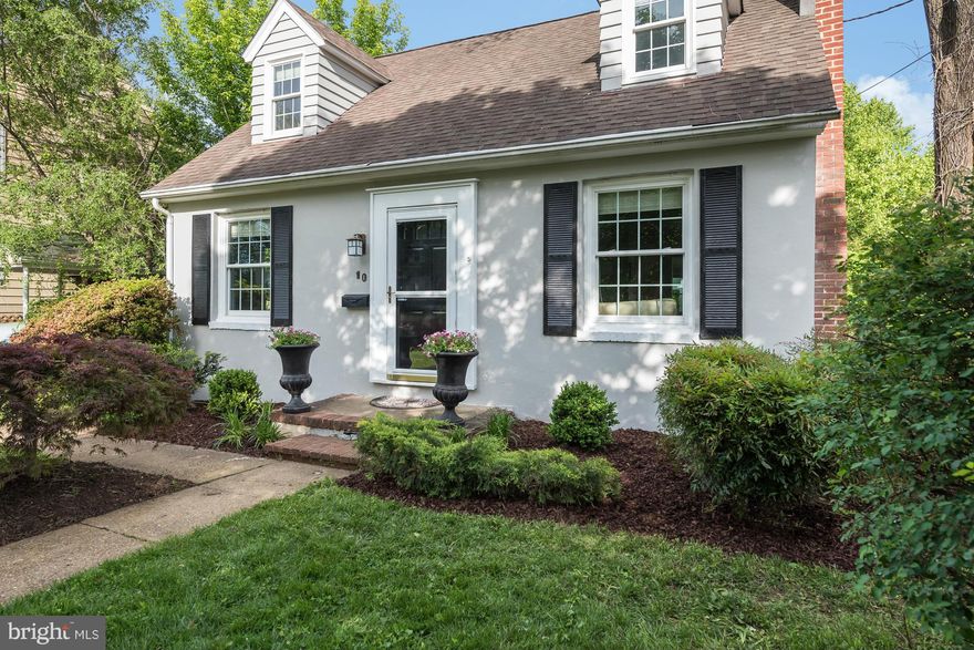 Picture perfect Cape Cod in the desirable Homewood Neighborhood. Open living and kitchen area with hardwood floors and bonus glass enclosed, all season sunroom.  Updated kitchen with granite counters and custom cabinetry, newer windows throughout and private fenced backyard. Close to shopping and restaurants & easy access to Route 50. It's a must see!