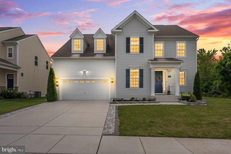 Luxury, lifestyle, and community come together beautifully at 821 Bentgrass Drive. Tucked inside one of Aberdeen’s most desirable newer neighborhoods, this stunning home offers the perfect blend of elegance and warmth while being conveniently located near shopping, major commuter routes, and Aberdeen Proving Ground.
Featuring 5 bedrooms and 4.5 baths, this beautifully designed home sits on a premium lot with only one side neighbor and direct access to nearby walking trails perfect for biking, evening strolls, or walking the dog.
Outside, the nearly quarter-acre fenced backyard is an entertainer’s dream with stylish black aluminum fencing, a newly added deck, and a cozy climate-controlled porch — the perfect setting for morning coffee, summer gatherings, or relaxing evenings under the stars.
Inside, an elegant two-story foyer creates an unforgettable first impression. Luxury plank flooring, designer paint colors, and sophisticated finishes flow throughout the main level. The heart of the home is the breathtaking gourmet kitchen and family room featuring coffered ceilings, a cozy fireplace, granite countertops, an oversized island, and abundant cabinetry.
One of the two luxurious owner’s suites is conveniently located on the main level in its own private wing, offering endless flexibility for multigenerational living, guests, a home office, or a private retreat. Upstairs, the second owner’s suite features a spa-like en-suite bath and oversized walk-in closet, along with three additional spacious bedrooms, a full bath, and a charming flex space ideal for a reading nook or guest lounge.
The fully finished walkout lower level provides even more versatile living space with room for game nights, movie nights, a home gym, playroom, workshop, storage, and a full bath.
Elegant yet inviting, luxurious yet functional — this is the kind of home that truly has it all.