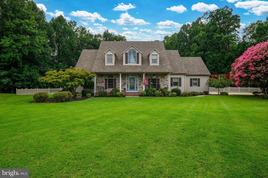 A private, park-like retreat set on 3.3 acres, where timeless charm meets resort-style living—this exquisite custom-built 3-bedroom, 3 full and 2 half bath home is filled with thoughtful details, from custom molding and wood accents to beautifully designed living spaces throughout. The gourmet kitchen showcases stunning countertops, custom tile work, a gas cooktop & oven, and quality cabinetry, while the sun-filled family room overlooks the pool and features a gas fireplace with eye-catching woodwork.

The first-floor primary suite offers a spacious, relaxing escape with a beautifully appointed bath and dual shower areas. A flexible room provides the perfect space for a home office or den, and the well-designed layout includes two powder rooms—one conveniently located for poolside access. Even everyday tasks feel elevated with a generously sized laundry room complete with a dog washing station.

Upstairs, you’ll find two additional bedrooms, two full baths, and an expansive bonus space ideal for a recreation room, office, or overflow guest area. Storage is abundant throughout, complemented by an oversized 3-car garage with sealed floors.

Step outside and you’ll understand what truly sets this property apart—an incredible outdoor setting featuring a fenced backyard, heated saltwater pool, outdoor shower with an additional dog wash station, and a conditioned workshop or “she shed” perfect for hobbies or quiet retreat. Surrounded by lush landscaping supported by an irrigation system and backed by serene woods, this property offers privacy, space, and a lifestyle that’s hard to match.