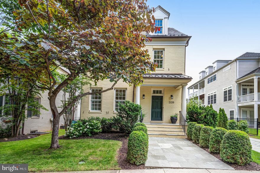 Open Sunday 1-4pm! Nestled quietly in a prime Rosslyn location and a short distance to everything! Beautiful sun-filled Colonial home, designed by the acclaimed Moore Architects, boasts stunning finishes throughout. Featuring antique reclaimed oak hardwood floors and numerous builder upgrades, this residence offers a chef's gourmet kitchen with a 48” 6-burner double-sided Wolf cooktop stove with griddle, Sub-Zero fridge and freezer, honed marble and granite countertops, all opening to a family room with coffered ceilings and plantation shutters. Main Level 11' ceilings!  Step out to a beautiful porch and fenced perfect  backyard. 1 Car detached garage with a room above (roughed in but not finished) perfect for an au pair suite or studio. 5 bedrooms upstairs, including a beautiful primary bedroom with a luxurious bath and walk-in closets, this home has an ELEVATOR shaft to all 4 floors. The lower level features a spacious rec room, an additional bedroom, and a full bath. Beautifully landscaped with Irrigation system. A commuter's dream location, this home is less than a 1-mile walk to Key Bridge, Rosslyn Metro, MOM's Organic Market, Courthouse, restaurants, shops, and more. Just steps away are the newly renovated Dawson Terrace Park and Custis Trail. Schedule a visit today!