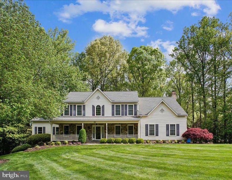 Welcome to Upper Wynnewood Court  - Sited on an ideal, acre-plus lot in one of Oak Hill’s most prime locations, this Modern Colonial marries classic country curb appeal to a thoroughly modern aesthetic. Its corner location is ideally sited between two quiet cul de sacs.  Spanning approximately 5,600 square feet of beautifully updated living space, this stylish home boasts 4 bedrooms, 3.5 renovated baths, and an inviting, comfortable flow. Gleaming, finished-on-site hardwood floors grace the main level, upper hallway, and primary suite. Light-Filled Main Level Living is what it is all about. An elegant two-story foyer is flanked by a quiet home office and a formal living room.  Just beyond the living room is a private conservatory with a cathedral ceiling. Use this room as an additional sitting room, home office, or music room. Tucked into the rear corner for privacy, the formal dining room overlooks the lush backyard through a wide bay window. 

The heart of the home is the extraordinary, chef-inspired kitchen. Designed with exquisite granite countertops and an enormous center island, it features premium appliances to include a Thermador 6-burner gas cooktop and double ovens and a built-in Sub-Zero refrigerator. The built-in microwave is conveniently located in the center island. Designer details include a  stylish tile backsplash, under-cabinet lighting, and abundant cabinetry—including glass-front display cabinets with interior lighting.  For seamless casual dining, the spacious breakfast room with a custom buffet bar opens directly to an idyllic screened porch and deck. The kitchen flows effortlessly into the expansive family room, which is anchored by a handsome gas fireplace with a stone facing and hearth. Just beyond, a sun-drenched sunroom awaits, bathed in natural light from a cathedral ceiling with twin skylights and walls of windows. A well-equipped laundry/mudroom provides a practical transition from the two-car garage.

A peaceful and comfortable upper level retreat awaits. The genuine oak hardwood floors continue upstairs and lead into a sumptuous primary suite. This private sanctuary features two walk-in closets with custom shelving and a stunning, marble-floored bath complete with a soaking tub, a frameless glass shower, and a double-bowl granite vanity. The granite, marble, and tile feature a timeless palette of soothing earth tones.  Three additional auxiliary bedrooms share a large, beautifully updated hall bath with a double-bowl vanity, with one bedroom enjoying direct, private access. 

The versatile lower level  offers a sprawling recreation room alongside a "bonus" room—perfect for a home gym, media room, or easily enclosed to create a fifth bedroom. A fully updated bath sits conveniently nearby, while a large unfinished area leaves ample room for storage. Step outside the rec room onto an expansive flagstone patio complete with a stone seating wall—an absolute dream for large-scale outdoor entertaining. Enjoy evenings under the moon w/your built-in Sonos sound system. The grill is ready to go with its direct gas feed!  Beyond the patio, the level, park-like backyard offers plenty of open space for play equipment and activities. This move-in-ready property has been meticulously maintained and updated to the max, including fresh paint throughout the interior, new hardwood flooring in the family room, conservatory, and primary bedroom, a newer roof and replacement windows. Contact listing agent for a full list of updates. 

Located off Bennett Road, one of the prettiest, tree-lined streets in Oak Hill, Upper Wynnewood Court offers a peaceful retreat that is incredibly convenient to Northern Virginia's best amenities: 
Groceries: 15 minutes to Whole Foods or Wegmans. Shopping & Dining: 10 minutes to Fairfax Corner, 15 minutes to Reston Town Center, 30 minutes to Tysons and situated in a highly sought-after school pyramid including Navy Elementary, Franklin Middle, and Oakton High School.