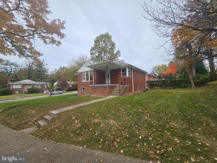 Beautiful brick rambler on corner lot with garage. Home features 4 bedrooms, 2.5 baths, living room w/fireplace with hardwood floors through out, dining room, kitchen, and stainless steel appliances, family room, and garage with work space. Home has been freshly painted.  Large windows that gives natural light throughout the house. Nice covered front porch. Close to 495, metro, public transportation, restaurants, and shops.