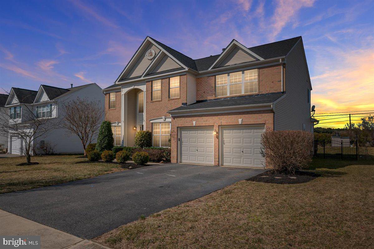 Welcome to 221 Northfield Way in the sought after North Brook Community. This GORGEOUS brick front colonial is ready for you to move right in! As you walk into this home, you are greeted with a stunning 2 story foyer that is wide open with hardwood floors, a double staircase, and perfect finishings. To the immediate right you have the main level home office. (This room could also be used as a playroom, separate tv room, or whatever you need it to be.) Coming back into the foyer you have the large living room to the left and that is all open to the HUGE dining room. Plenty of space for gatherings and holidays! As you walk down the hallway from the foyer, you have a half bathroom, and then it opens up to the open floor plan with the GORGEOUS kitchen and OVERSIZED family room with all new flooring. The kitchen is STUNNING. Large island with cooktop, ample cabinet and counter space, double wall ovens, and eat in table space. The OVERSIZED family room boasts a gas fireplace surrounded by stone, and a plethora of natural sun light beaming in. Off of the kitchen you will find the relaxing 3 seasons room. Come enjoy the warm days and nights out here and escape for a while. Moving upstairs you will find a large hallway, 4 HUGE bedrooms, laundry room, and 2 full bathrooms. Each secondary bedroom offers ample closet space. The hallway bathroom boasts a double vanity, tile floors and a tile shower. The owner's suite is PERFECTION. Large, open, with vaulted ceilings, and boasting a gas fireplace to give that it that sense of calmness. Off of the owner's suite is a whole other space that can be used in so many ways: sitting room, home gym, home office, closet, craft room, or possible 5th bedroom. The possibilities are endless with this room! The walk in closet is what you have been waiting for!!! Room for EVERYTHING!! Moving into the LARGE owner's suite bathroom, you will find, tile floors, his and her vanities, soaking tub and tile shower. Moving back downstairs to the main level, you will find a conditioned and finished 4 ft crawlspace that is the ENTIRE length of the house. This is PERFECT for STORAGE. You can actually USE your 2 car garage to park your cars into because it offers so much storage!!! Out back of the home will find a nice sized deck and yard. Brand NEW roof just installed 2 weeks ago!!! The community offers a playground, soccer field, pavilion, walking path, ponds, and woods to explore! This home is ready for YOU to make it your own. Don't let this one slip by!!!