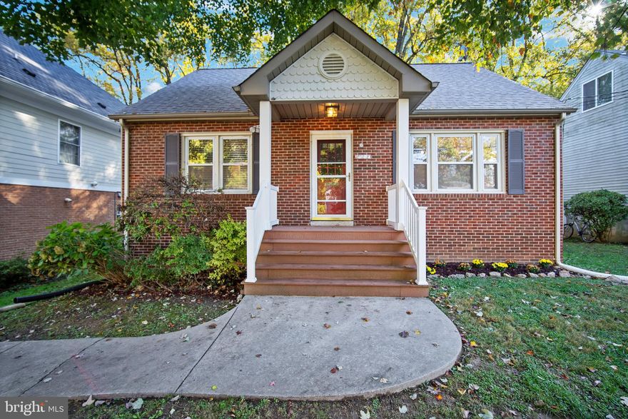 Back on the market just in time for you to find a home for the holidays😀Welcome to this charming expanded cape cod! Spacious addition stretches beyond original house. Stunning red crushed quartz countertops in eat-in kitchen.   Beautiful wood floors in the great room which also features remotely controlled skylights, recessed lighting and  a corner fireplace.  The screened porch in the back looks out to your own private forest.   First floor main bedroom with ensuite bathroom, walk-in shower and laundry area.  Newer windows; updated, remote controlled ceiling fans. Front room on first floor can be used as an office, library or entertainment room.  Two bedrooms up with full bath in between. Huge unfinished  basement-ready for your design--just needs drywall and paint. HMS Home Warranty included! Easy access to metro, Route 28 and 270 but without all the noise from the road as it is well-insulated. New roof in 2016. Richard Montgomery, Julius West and Beall.  Right next to the beautiful historic homes of Rockville. Blocks from Town Center, yet next door to the path leading to the park and Rockville Aquatic Center.