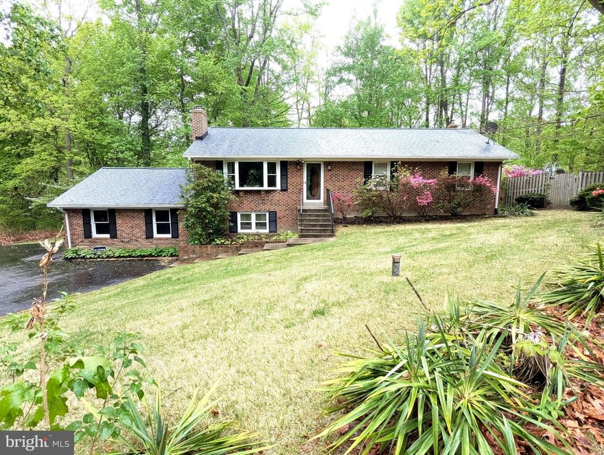 Lovingly cared for home!! - Charming 3-Bedroom Retreat on 2.8+/- Acres in Ridge View Estates – Owings, MD. Nestled among the trees, this serene 3-bedroom, 3-bathroom home offers the perfect blend of privacy, comfort, and convenience. With an expansive family room perfect for gatherings. a glassed in deck/sitting area ideal for entertaining, sipping coffee or simply enjoying peaceful views of nature. With 3 generous bedrooms ( possible 4th Bedroom in basement ) and 3 full bathrooms, there’s room for everyone to spread out and feel at home. Roof is just 4 years young, the kitchen was upgraded in 2019 with granite counter tops and stainless steel appliances. Newer windows and HVAC system(s). Just a short and easy commute to Washington, DC, and minutes from the Chesapeake Bay and quaint coastal towns, this location offers the best of both worlds—seclusion and accessibility. Don't miss this rare opportunity to own a tranquil slice of Maryland living!