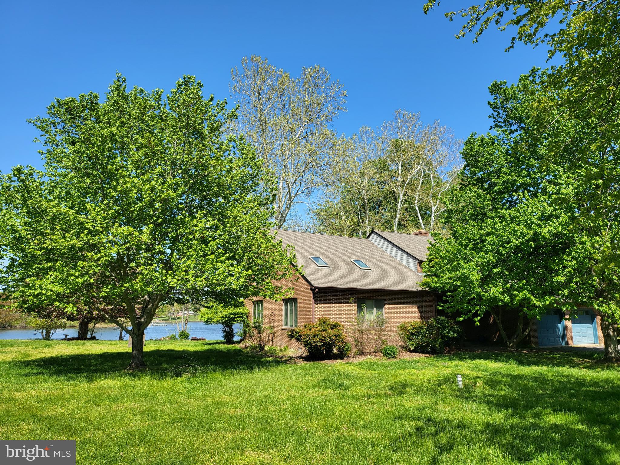 Great news! Seller has decided to lower the Purchase Price to accommodate Buyers impacted by the rise in interest rates. Unfortunately, inside pics are not available until the tenants move out 30 June 2022. However, look at the closed rental listing pics for an idea of the homes lay out (MLS# 1003265679). Come see this all brick contemporary, waterfront home located on 21.25 acres. This home features 5 Bedrooms, 3 Full Bathrooms, 2 Car Garage, and a screened in Porch. In addition, a Deck that spans more than 50% of the width of the home overlooking the boat slip with a pier just off St Clements Bay. The Primary Bedroom features a private terrace with waterfront views, a bathroom with skylights, dual vanity sinks, and separate shower and bathtub. The 1st floor has hardwood flooring, a brick fireplace with crown molding, a 2 story sloped ceiling, split staircase, dining room/office area, living room with egress to the deck, bedroom, and 2nd floor balcony overlooking it. The Eat-in-Kitchen has a center island, tile floors, with egress to the deck. This rare opportunity waterfront home is priced to sell. The property is occupied, please schedule an appointment and receive confirmation before visiting. All bedrooms have a waterfront view! This property has been appraised 02 FEB 22 for $827,000. Appraisal will be made available as offers are received. As of 6/8/22 the Seller has accepted an offer with a kick out clause that will be removed after the Home Inspection contingency is removed. Showings and offers are permitted.