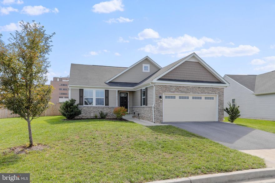 Amazing rancher with all new Luxury Vinyl Plank Floors installed on large lot with fully fenced rear yard.  Home features beautiful kitchen cabinets, granite countertops, walk in closets, and a wide open floorplan.  This home is very close to all commuter routes centered in between Charles Town and Martinsburg backing up to common space and the VA Hospital Center.  Community features sidewalks, tot lots, and walking trails!