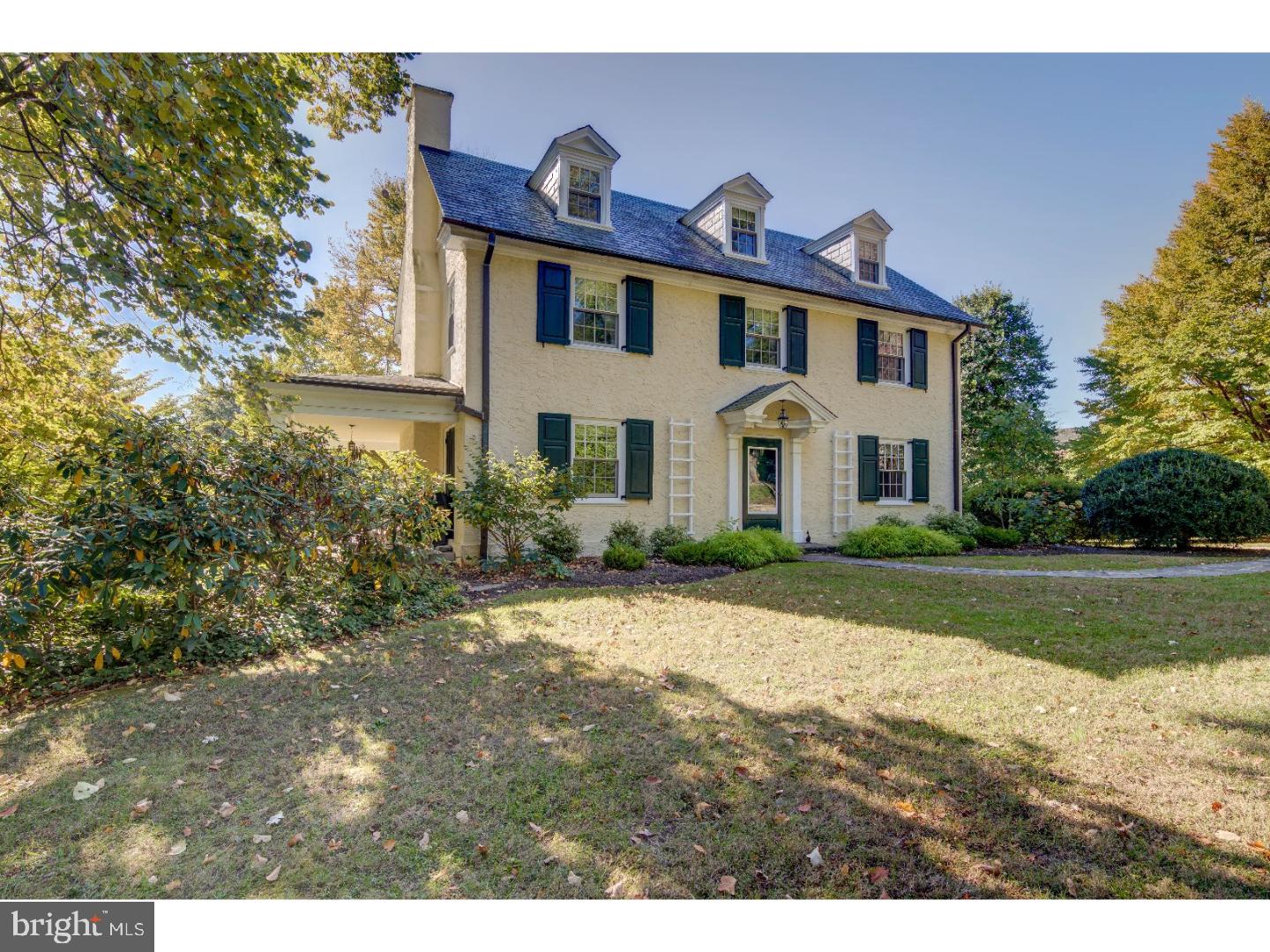 Welcome to this grand 3 story, 1914-built stucco classic center hall colonial in northside Villanova. Tucked away on a private lane, this 6 bedroom 4 1/2 bath slate roofed gem with detached 2 car garage is situated on over 2 acres of tranquil tree lined grounds. The traditional floor plan features an inviting entry leading to a stately living room on the left with hardwood floors, wood burning, stone surround fireplace flanked by French doors opening to a lighted covered porch ? perfect for relaxing and entertaining. To the right of the center hall is a large formal dining room with high a ceiling and hardwood floors. An addition to the first floor is a cozy sun drenched garden room with an exit to a deck and access to the powder room and the large kitchen with original butler's pantry, mudroom/laundry room and covered back porch off the driveway A perfect space to design your own special kitchen centerpiece. The second floor boasts a large delightful master bedroom with walk-in closet and attached bath; two additional guest rooms with shared bath and a guest/au paire suite with its own bath with claw-foot tub plus private back stairs to the kitchen. The third floor features two large guestrooms, a shared hall bath with claw- foot tub and attic storage. The expansive lower level actually contains two basements ? the main one with interior and exterior entrances which contains the utilities, storage & workbench and a secondary gardener's room with exterior entrance allowing for even more storage. Highlights of this lovely, well maintained home include an impeccable slate roof, copper gutters & downspouts, 2-zoned air conditioning, a newer generator, updated electric, newer windows, hardwood floors and original wood doors with crystal knobs. Located in award winning Lower Merion School District, this is an excellent opportunity to own a wonderful classic colonial in a lovely neighborhood with easy access to the trains, shops & restaurants.