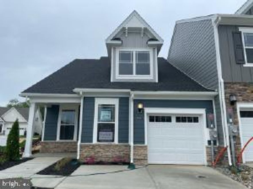 Active 55+ | St. Charles – Parklands | End-Unit Villa | Hamlin Model (Lot K133) | New Construction | May 2026 Move-In!

Welcome to this stunning new construction end-unit villa located in the highly sought-after 55+ community of St. Charles – Parklands in White Plains, MD.

This thoughtfully designed 1-car garage villa features 2 spacious bedrooms and 2 full bathrooms, with stylish ceramic tile flooring and finishes throughout the bathrooms. The gourmet kitchen is equipped with granite countertops and stainless steel appliances, and it opens seamlessly into the main living areas, perfect for both everyday living and entertaining.

Wide-plank flooring flows throughout the foyer, kitchen, dining area, and family room, creating a warm and cohesive feel. The owner’s suite serves as a private retreat, complete with tray ceilings, a spa-inspired bathroom, and a generous walk-in closet.

Enjoy indoor-outdoor living with sliding glass doors that lead to a screened-in porch perfect for morning coffee or relaxing evenings under the stars. A secondary bedroom located off the foyer offers a quiet and comfortable space for guests or family.

This end-unit villa home offers added privacy and an abundance of natural light, enhancing the open and airy feel throughout. Additional features include a 1-car garage and a private driveway for convenience.

Residents enjoy a true low-maintenance lifestyle, with the HOA covering all landscaping and snow removal, including the driveway.

The one-of-a-kind clubhouse offers an impressive array of amenities, including a fully equipped fitness center, private office space, a stylish bar area, pool tables, and dedicated spaces to relax and watch the big game. The clubhouse also features beautifully designed bathrooms with showers for added convenience.

Outdoor amenities are just as exceptional, featuring an Olympic-size pool, grilling stations, a cozy fireplace lounge, pickleball courts, and open spaces for concerts and community events, plus so much more.

Take advantage of the benefits of new-construction living, including modern finishes, energy efficiency, and a vibrant active-adult lifestyle.

 For a limited time, the builder is offering a $20,000 incentive toward closing costs when using the preferred lender, making this home an even more exceptional opportunity.

Don’t miss this incredible opportunity; schedule your private showing today!