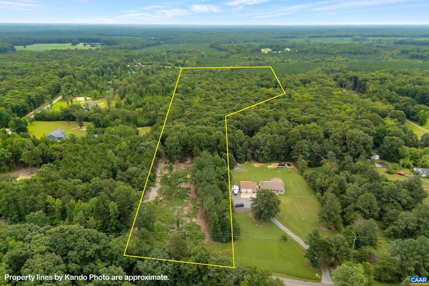 Ready to build! Great 13.6 acre lot minutes from Lake Anna. Driveway in, site cleared and 16x12 building up. Great trails, and  no HOA! Enjoy the lake life with privacy galore!