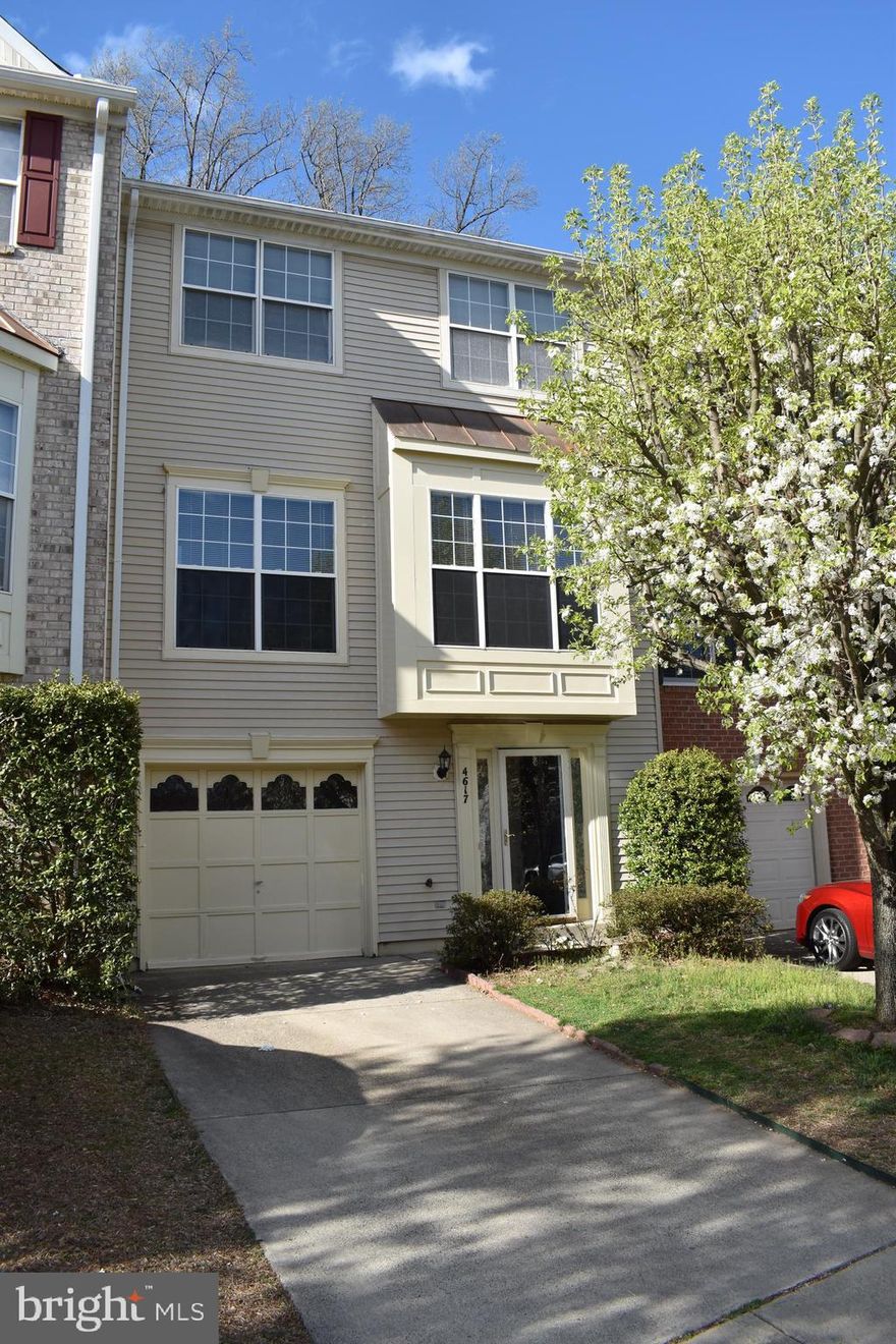 Spacious Three Wonderful Living Levels Townhouse with One-Car Garage.  Hardwood Floor throughout for the "Elegance Factor".  Open and Great Entertaining Floor Plan, a Recreation Room/Den with Powder Room on the First Level.  The Spacious Open Concept Kitchen connects to the airy and bright Living Room and Dining Room at the Main Level.  A huge Deck back to woods perfect for Entertaining and BBQ.  The huge Primary Bedroom Suite, Two additional Bedrooms with Full Bath and Laundry Room are at the Top Level. 
Convenient Location!