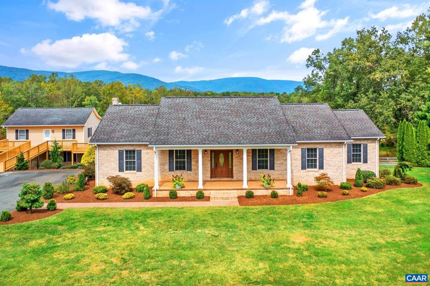 Experience the charm of this stunning 3-bedroom-2 flex rooms , 4-bath home nestled in the picturesque Albemarle County, set against a backdrop of over 12 acres featuring spectacular mountain views. This meticulously maintained residence boasts elegant hardwood flooring and a beautifully crafted oak kitchen, complete with a cozy breakfast nook and a spacious pantry.  The convenient walk-in laundry room is equipped with a utility sink, making daily chores a breeze. Designed with versatility in mind, this home includes two fully equipped kitchens and a terrace-level entry, making it ideal for hosting guests or accommodating in-laws.  Step into the inviting family room, where soaring cathedral ceilings and rustic wood beams create a warm, welcoming environment. Additional features include a detached garage with a workshop area and a dependable full-house generator. Freshly painted and surrounded by mature landscaping, this home possesses remarkable curb appeal.  The wrap-around deck on the garage is the perfect spot for outdoor gatherings, and there?s also potential for a 6th bedroom, home office, or gym?limitless possibilities await! Seize the opportunity to make this exceptional and beautifully designed home yours today!,Formica Counter,Oak Cabinets