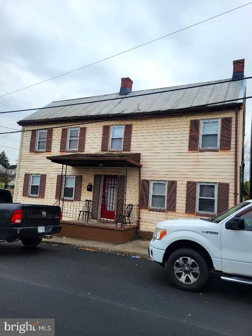 Investor Special  Currently rented on a month to month basis.   Large fenced corner lot.  Property being sold as is