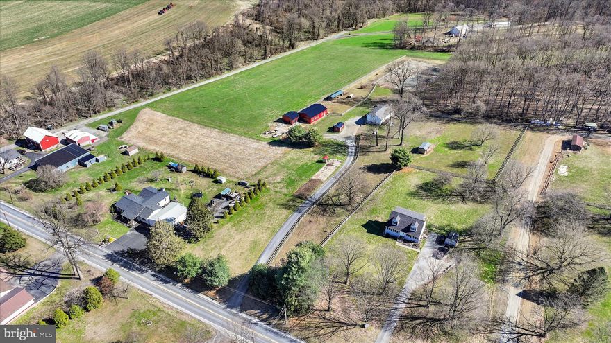 Welcome to 411 Red Hill Road in Pequea—a private **10.69-acre farmette** nestled in the scenic countryside of Martic Township within Penn Manor School District. Built in 2005, this **3-bedroom, 2-bath bi-level home** offers over **2,600 square feet of living space**, including a finished lower level, central air, and an efficient electric forced-air system. The home features a functional layout with spacious living areas and a full basement with garage access. The expansive acreage provides a blend of open land and privacy—ideal for hobby farming, recreation, or simply enjoying the peaceful rural setting. With well and on-site septic, low annual taxes, and plenty of room to expand or customize, this property offers a rare opportunity to own a versatile country homestead in southern Lancaster County! No Sunday showings.