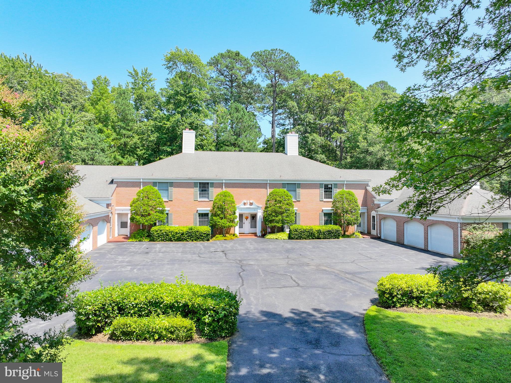 Martingham, a golf course and waterfront community just a mile outside of Historic St. Michaels with all of its amenities. This Widgeon Place condo is a two-story condo with two en-suite bedrooms and a half bath on the first floor. Living room and dining room are an open floor plan with hardwood floors and fireplace. From the sunroom you can step onto a brick patio which looks out to treed area creating privacy. Large primary suite with en-suite bath and balcony. Come take advantage of The Links at Perry Cabin or the community waterfront lot overlooking the Miles River where you can enjoy a parade of boats on their way to St. Michaels Harbor. Property is being offered as-is.