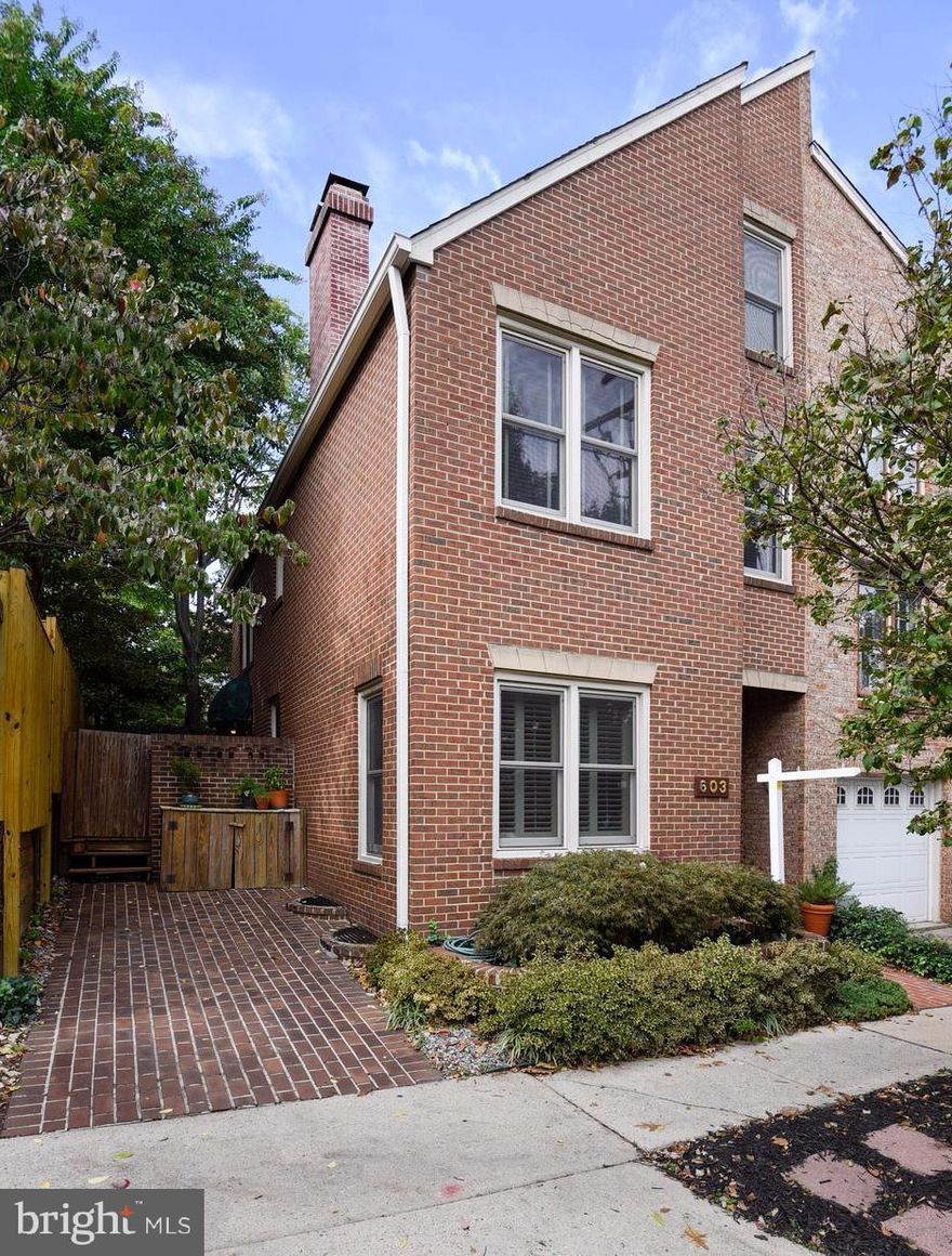 Old Town Alex: Beautiful 3 BR, 2 full & 2 half BA townhouse with 2 off-street parking spaces. This charming end-unit welcomes you with soaring ceilings, HDWD floors, plantation shutters, crown/chair molding, FP & a private deck off the updated kitchen. MBR spans 2 levels with light-filled loft, updated BA & ample storage. Finished basement with 2nd FP & custom built-ins. No condo or HOA fees.