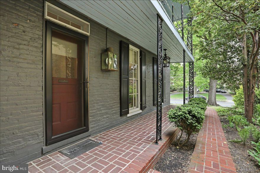 Nestled in the charming North End of Chambersburg, this exquisite detached residence, originally built in the late 1800's and masterfully renovated in 2013, offers a perfect blend of historic charm and modern luxury. The exterior showcases a classic brick façade complemented by a graceful brick walkway, flanked with lush ferns, ivy, lily of the valley leads you to a charming wrought iron porch. Enjoy leisurely strolls along the sidewalks that grace this picturesque community. Step onto the welcoming porch and take in the serene atmosphere, perfect for evening relaxation. The expansive balcony provides an ideal vantage point for enjoying the morning coffee. There's ample outdoor space for gardening or play. Inside, the home boasts five spacious bedrooms, ensuring plenty of room for comfort and privacy. The full basement offers endless possibilities for customization, whether you envision a recreation room, home gym, or additional storage. The detached garage, equipped with a garage door opener and additional storage area, enhances convenience and functionality. This property is not just a home; it's a lifestyle, offering a unique opportunity to embrace both luxury and comfort in a vibrant community. The kitchen features gorgeous granite - topped farmhouse kitchen, surrounded by built- in cabinets and imported porcelain tile.  Natural light floods in from the tall windows, and the original hardwood floors throughout the home bring timeless warmth.  The original 1800's hearth still stands in the rear of the home.  Experience the perfect blend of historic elegance and modern amenities in this stunning residence.