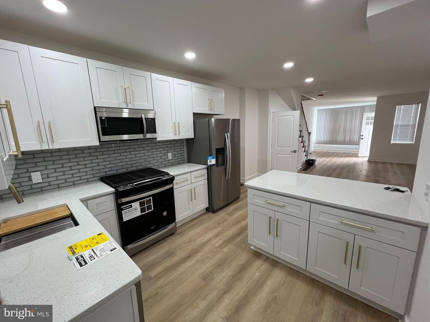 Stunning 3 bedroom, 2 full bathroom home now available. Open concept layout living and dining area with new flooring, molding and recessed lighting. The kitchen features brand new cabinets with state-of-the-art self-closing doors, quartz countertop, sleek backsplash, and all stainless-steel appliances. Very large deck of the kitchen big enough for the entire family. The upstairs offers  3 spacious bedrooms and a beautifully renovated full bathroom. No detail was overlooked. The finished basement boasts plenty of open space for entertaining and new carpet. Downstairs also features a brand new full size bathroom. That's not all, this home features brand new HVAC, electric, plumbing,windows, doors and much more.