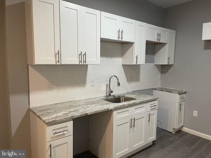 Welcome to 641 N Creighton St, nestled in the charming Mill Creek neighborhood. This newly renovated home offers a fresh and inviting living space with three spacious bedrooms and a brand-new bathroom showcasing stunning subway tile. The kitchen is a chef's delight, boasting new white shaker cabinets, ample cabinet and counter space, and brand-new stainless steel appliances, all ready for your culinary adventures. The rooms are generously sized, bathed in natural light, and provide abundant storage options. Enjoy year-round comfort with central air, and unwind on the enclosed porch. The bedrooms offer large closets and large windows that flood the rooms with natural light. Step outside to your amazing backyard space, perfect for enjoying sunny days. Be the first to call this beautifully refinished home yours, and experience a fresh start in a thoughtfully updated space designed for modern living.