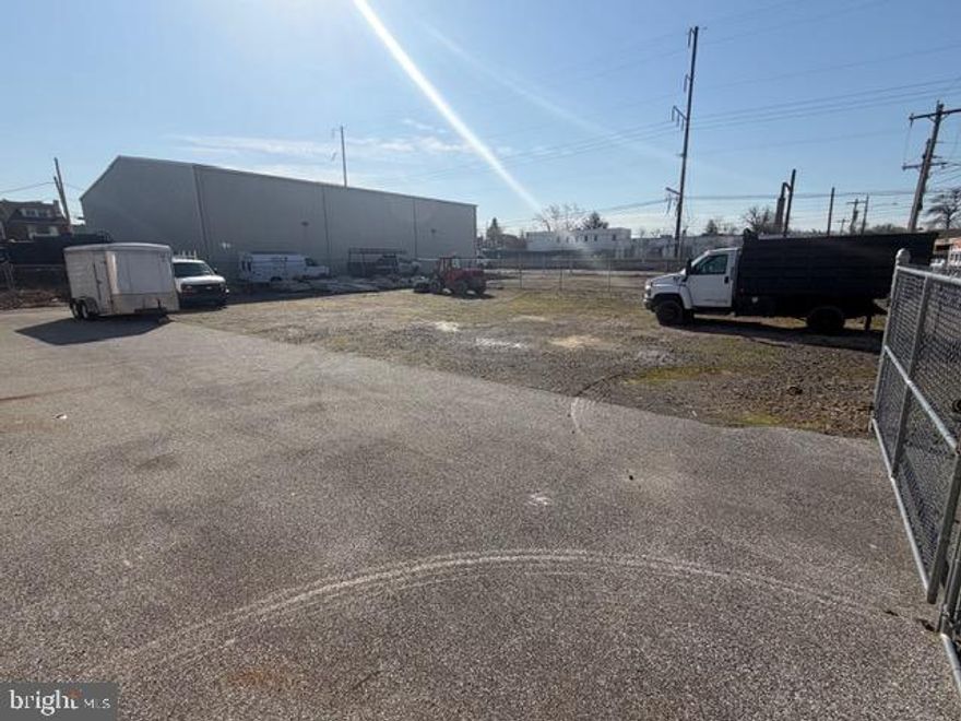 12,000 SF industrial flex space with 16,000 SF fenced in gravel lot. Building features 16' ceilings, 3 garage doors, Phase III power, 3 offices, 3 bathrooms. Offices have heat and air conditioning, warehouse has ceiling mounted gas heaters. Property consists of 5 parcels. This property offers enough space for owner operator and tenants.