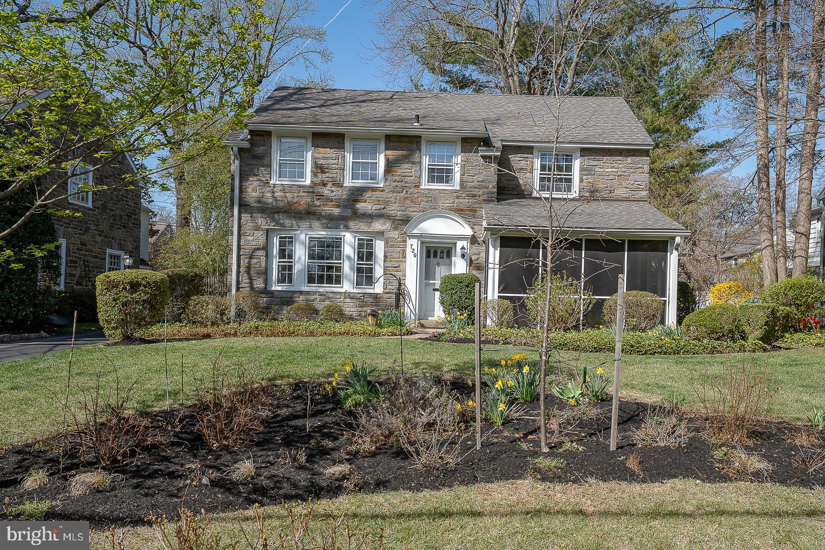 Discover the character and convenience of this classic stone home in Wynnewood, located in sought-after Lower Merion Township. This home combines classic appeal with modern comfort in a location known for its accessibility and established community. Offering 3 bedrooms, 2.5 bathrooms, and 2,356 square feet of living space, this residence blends timeless design with thoughtful updates.
A welcoming foyer leads to sun-filled living spaces with hardwood flooring throughout the main level. The living room features a wood-burning fireplace with a detailed mantel, custom built-ins, and a bay window that brings in natural light. The formal dining room is spacious and bright, with chair rail accents and views of the front garden. The eat-in kitchen is updated with new countertops and backsplash (2022), stainless steel appliances, and electric cooking. Adjacent to the kitchen, the sunroom with skylights and the screened-in porch offer peaceful spots to relax and enjoy the surrounding landscape.
Upstairs, hardwood floors continue into the well-appointed bedrooms. The primary suite features generous closet space and a private bath with a walk-in shower. Two additional bedrooms, one with custom built-ins, share a full hall bath.
Outside, the property offers a fenced yard with mature landscaping and a pollinator garden. Additional features include a Generac whole-house generator (2019), zoned HVAC with newer systems on the first (2020) and second floor (2022), public water, a repaved driveway (2020), and an attached two-car garage.
Enjoy close proximity to regional transportation, including Amtrak, SEPTA rail lines, and Wynnewood Station for convenient Regional Rail service, as well as quick access to major routes. The home is ideally situated near local parks, community amenities like South Ardmore Park and Penn Wynne Library, and a variety of shopping and dining options at nearby centers. Lower Merion School District is highly rated and they have full day kindergarten.