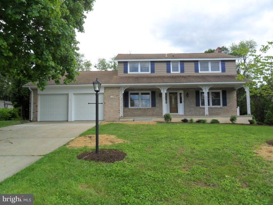 Fantastic colonial in a welcoming neighborhood.  Professionally remodeled with  gourmet kitchen, granite tops, tile backsplash, and upgraded stainless steel appliances.  Open floor plan concept with sliding doors leading to private, fenced rear yard.  Large family room with lots of natural light and stone gas fireplace.  Refinished hardwood floors.  New CAC - 2 zones, upgraded electric, new garage doors, new windows... Prof. landscaped, new patio