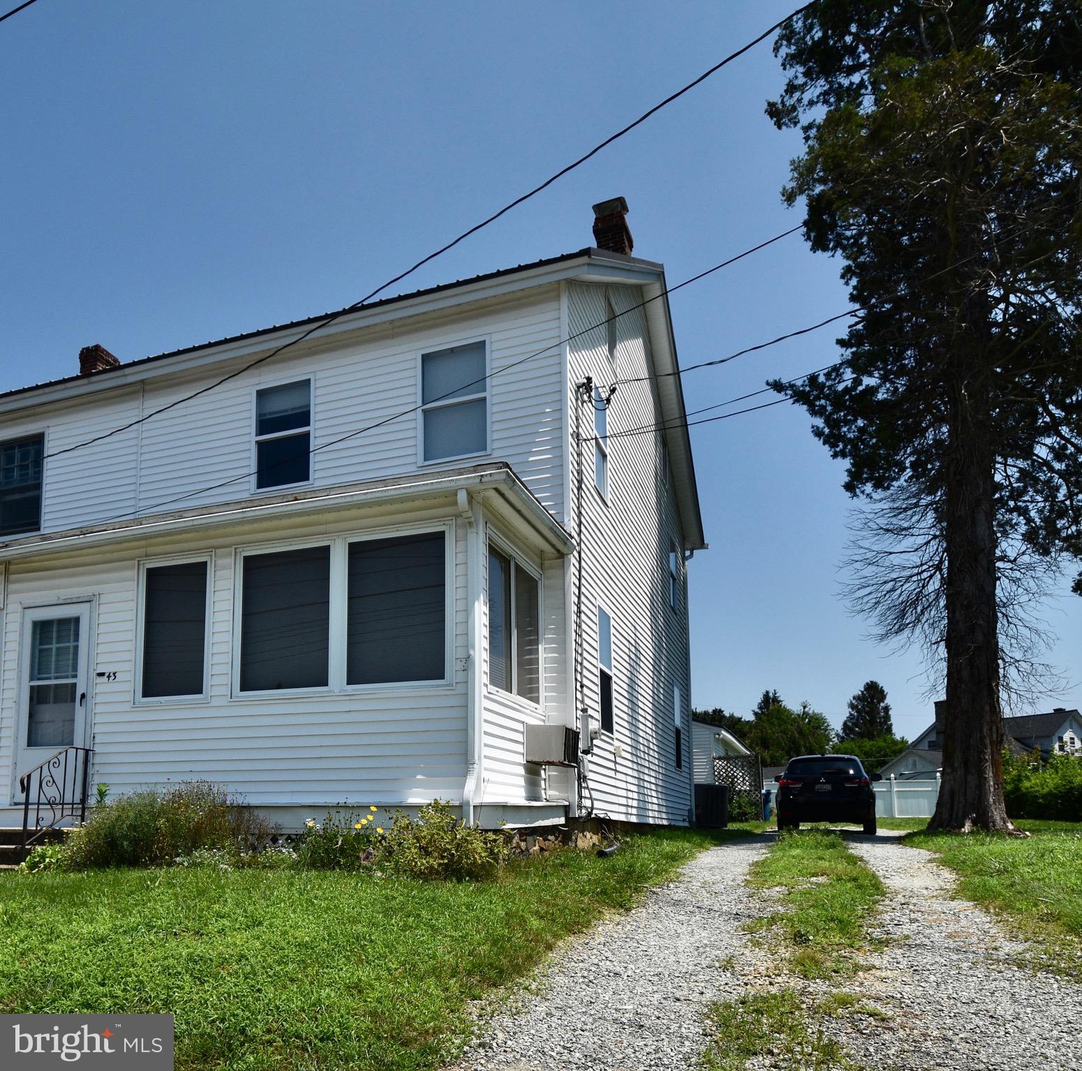 A great starter home for town living… stores, shops, schools, banks, and a pharmacy are all within a walking distance away of this 3br 2full bath home. Beautiful hardwood floors, metal roof less than a year old, brand new oil tank/filter lines, and an enclosed front porch. The views from the bedrooms are some of the best around … what a great way to start a life in this affordable air conditioned home…Schedule a tour today!