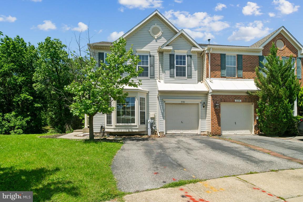 Welcome to 330 Timberbrook Ct, Odenton, MD 21113 — A Spacious & Stylish Townhome in a Prime Location! Tucked away in the sought-after Seven Oaks community, this beautifully maintained 4 bedroom, 3-bathroom townhome offers over 2,110 square feet of versatile living space designed for comfort and convenience. Step inside to find a bright, open-concept main level with gleaming hardwood floors, a spacious living/dining combo, and a modern kitchen featuring stainless steel appliances, ample cabinet space, and a cozy breakfast nook. Large deck with screened in porch and fire pit perfect for unwinding outdoors. Upstairs, the generous primary suite includes a walk-in closet and private ensuite bath, while two additional bedrooms and a full bath offer flexibility for guests, home office, or growing families. The fully finished basement provides even more living space boasting a media room, half bathroom, bedroom and storage area. This move-in ready home is a rare find — schedule your private tour today and discover all that Seven Oaks has to offer!